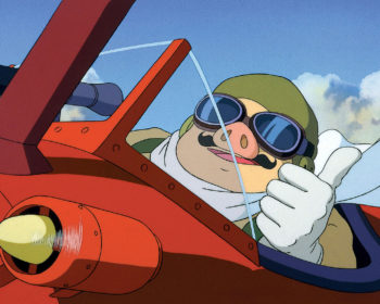 Le héros fictif Porco rosso dans son avion dans le dessin animé éponyme
